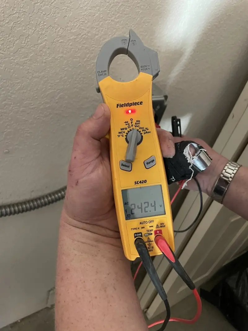 Voltage testing with clamp meter during Generator Installation in Bellaire